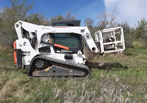 skid steer for fence removal